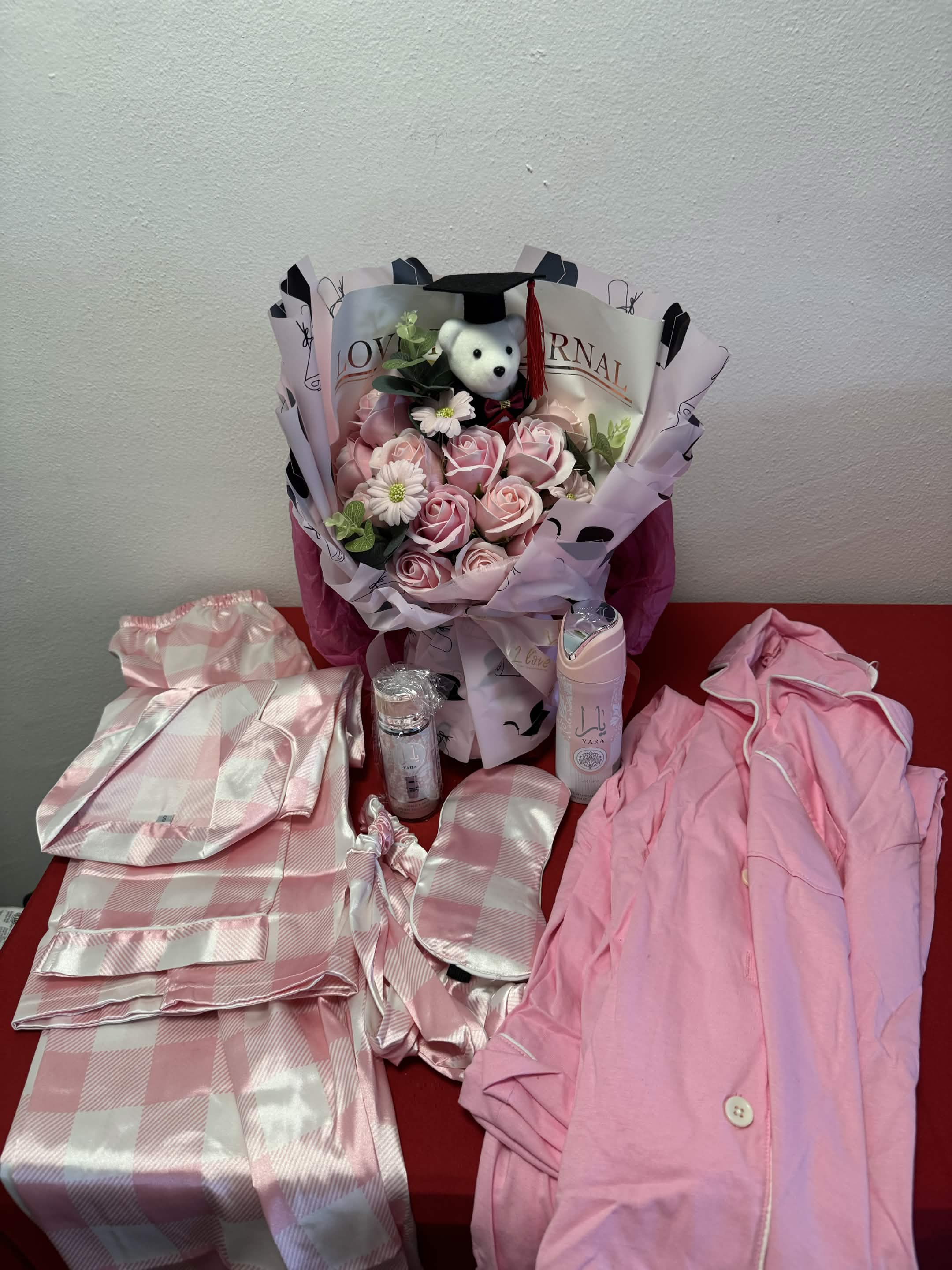 Premium Opulence statement gift basket arrangement with florals and satin bows